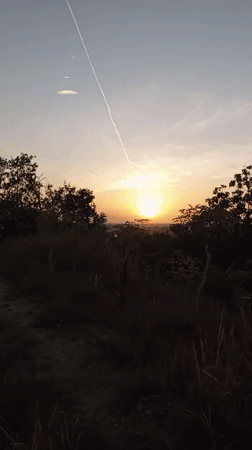 Sunset views from a Lhokseumawe hillside overlooking the coast