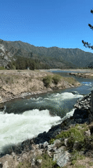 White water rapids filmed near old structures in Chemal