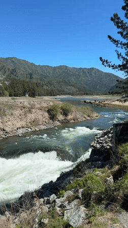 White water rapids filmed near old structures in Chemal