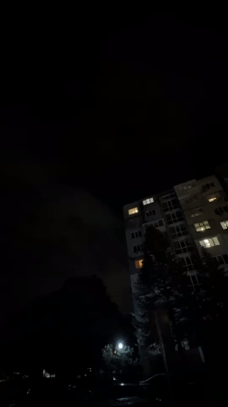 Nighttime apartment building scene captured in Varna, Bulgaria