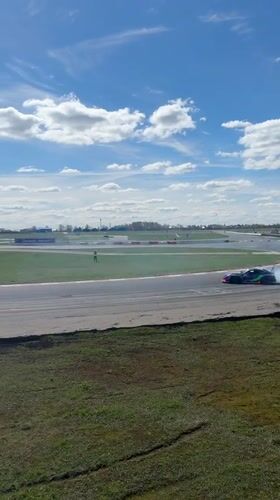 Drift cars perform synchronized maneuvers on Russian race track