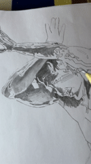 Artist sketches abstract human figures in Jos, Nigeria