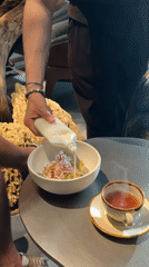 Tea and dressed salad at a Moscow restaurant table