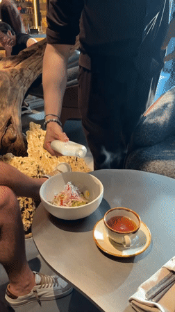 Tea and dressed salad at a Moscow restaurant table