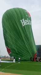 Heineken hot air balloon deflated on field in Ikoyi
