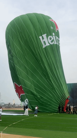 Heineken hot air balloon deflated on field in Ikoyi