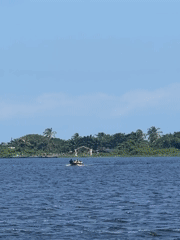 Afternoon at the Badagry lagoon shore, boats and waterfront life