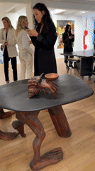 Evening art gallery reception draws visitors in NYC