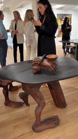 Evening art gallery reception draws visitors in NYC