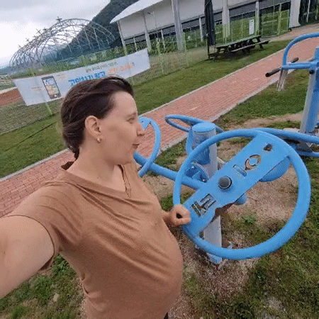 Toddler plays at a track complex under construction in Dunnae-myeon