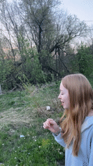 Friends capture spring moment by bridge in Сосново, Russia