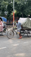 Morning street life documented across Dhaka during sunny weather