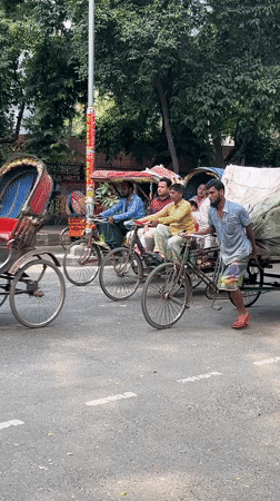 Morning street life documented across Dhaka during sunny weather