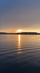 Golden sunrise/sunset captured over Russian lake