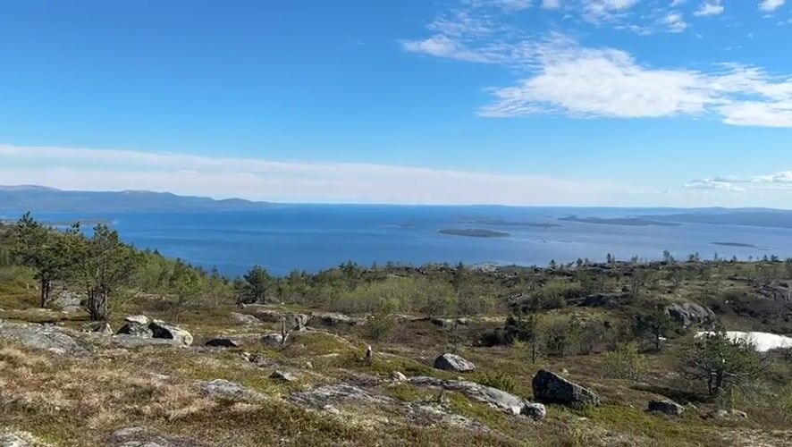 Spring landscape documented in Kandalaksha showing lingering snow patches