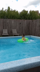 Mother and daughter enjoy summer pool day in Izhevsk
