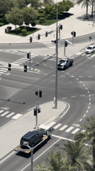 Coastal city morning: traffic, skyline views, waterfront amusement park