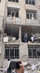 Building damaged in Tehran, emergency crews respond