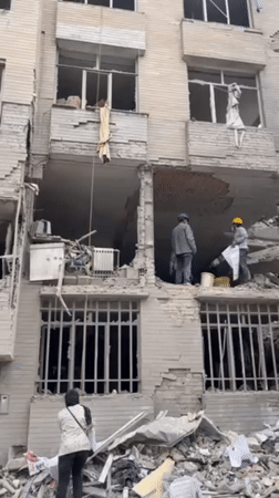 Building damaged in Tehran, emergency crews respond