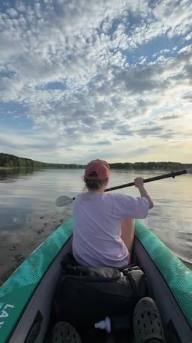 Sunset kayak outing captured on Kama River near Chaykovsky