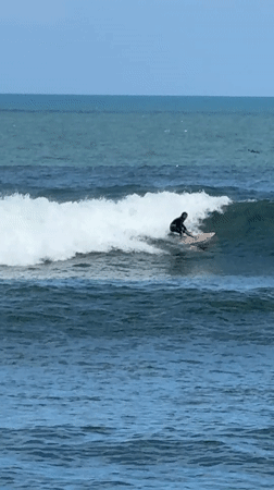Early morning surfing session captured at Kediri beach