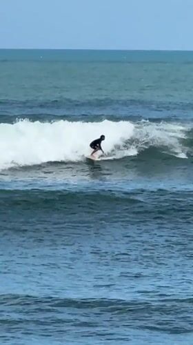 Early morning surfing session captured at Kediri beach