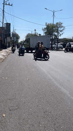 Morning traffic flows through East Java's Kludan streets
