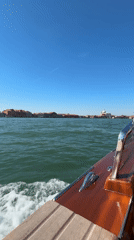 Morning boat ride captures Venice cityscape from water