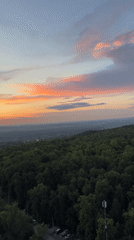 Sunset aerial views over Ufa forest hillsides