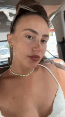 Woman photographed in moving car backseat, Phu Quoc