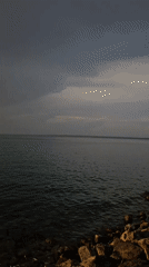 Sunset over Lake Constance from Rorschach's rocky shore