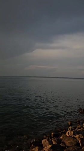 Sunset over Lake Constance from Rorschach's rocky shore