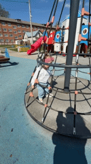 Mother, child enjoy morning playground visit in Reshetnikovo