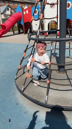 Mother, child enjoy morning playground visit in Reshetnikovo