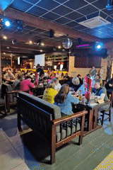 Restaurant dining and truck parking documented in Chaikovsky, Russia