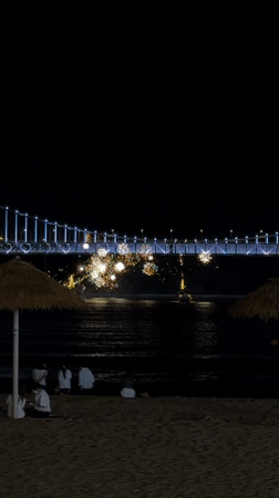 Fireworks light up Gwangan Bridge on a Busan summer night