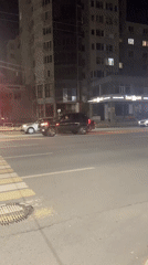 Evening snapshots from a Ufa street — traffic, decor, and shops