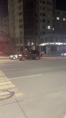 Evening snapshots from a Ufa street — traffic, decor, and shops