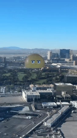 Aerial views capture sunny Las Vegas skyline and golf course