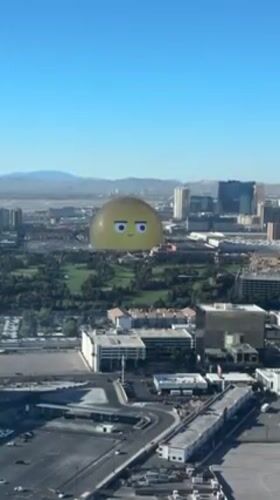Aerial views capture sunny Las Vegas skyline and golf course