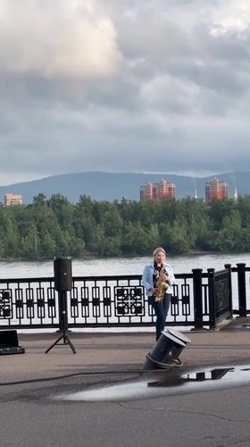 Saxophone performance by the waterfront in Krasnoyarsk