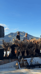 DJs perform outdoor mountain-view set in Kedisan, Indonesia