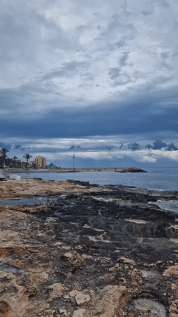 Coastal views and bronze statue captured in Torrevieja, Spain
