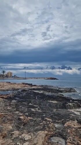 Coastal views and bronze statue captured in Torrevieja, Spain