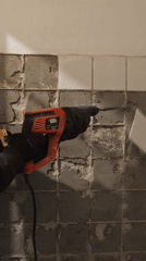 Tile demolition work during rainy weather in Hrodna
