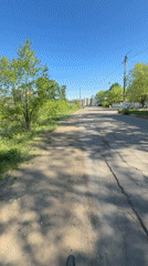 Woman cycles through Birobidzhan streets, captures selfie videos