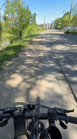 Woman cycles through Birobidzhan streets, captures selfie videos