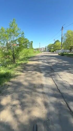 Woman cycles through Birobidzhan streets, captures selfie videos