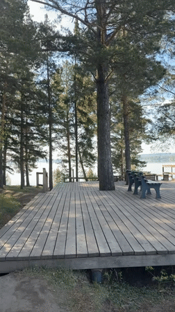 Wooden deck overlooking Votkinsk Reservoir documented on sunny morning