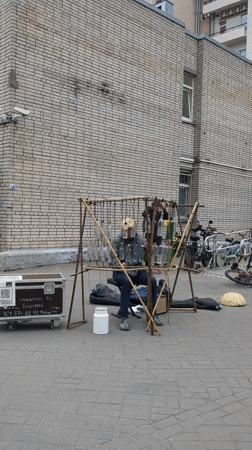 Street musician plays glass bottle xylophone in Saint Petersburg